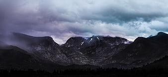 Dramatic Dark Mountain Landscape with Stormy Clouds