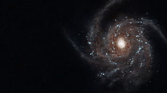 Spiral Galaxy In Deep Space With Bright Core And Dust Lanes