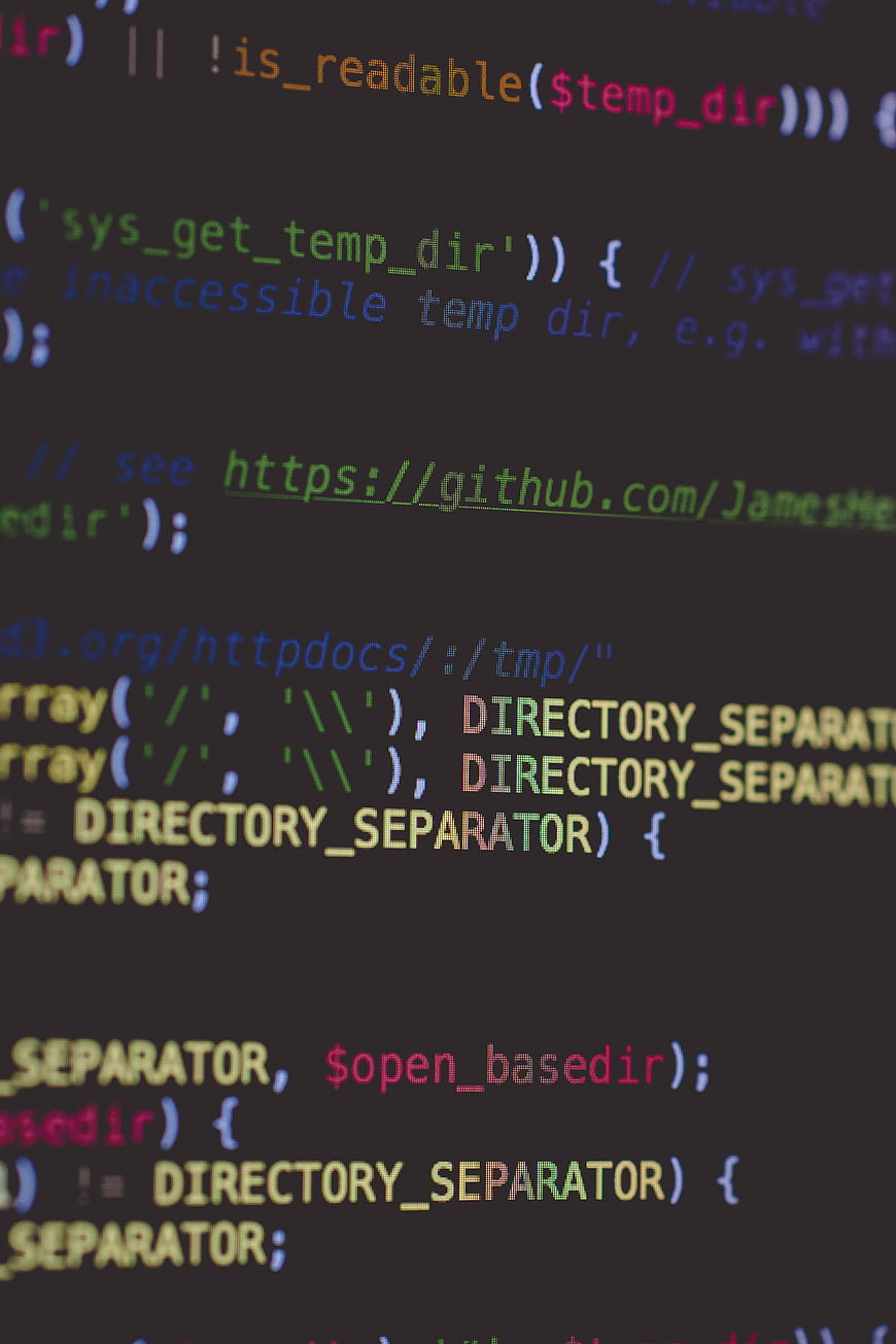 Close-up of PHP code on a dark computer screen