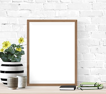 Wooden Picture Frame Mockup On White Brick Wall With Desk Decor