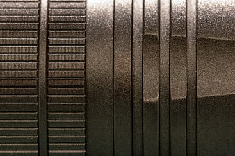 Close-up of black metal texture with industrial pattern