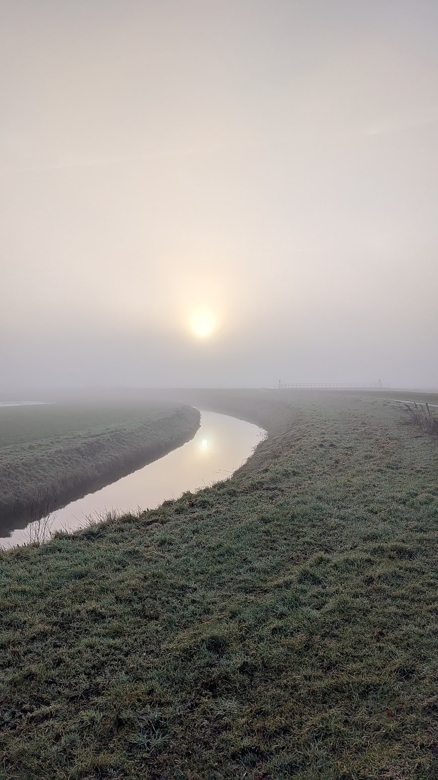 Frosty Canal Landscape with Foggy Sunrise