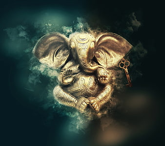 Golden Ganesha Statue with Mystical Smoke and Key
