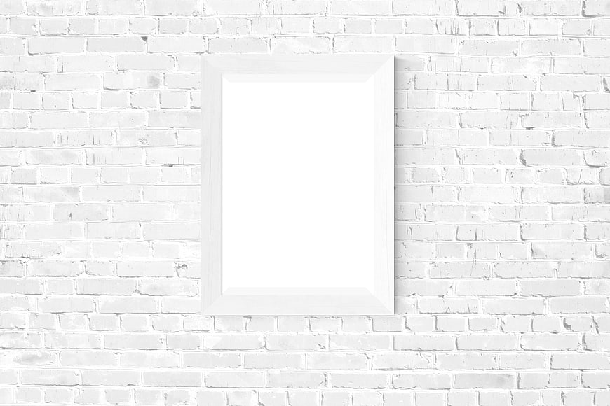 White Picture Frame Mockup On White Brick Wall