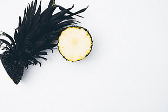 Black Painted Pineapple Slice on White Background