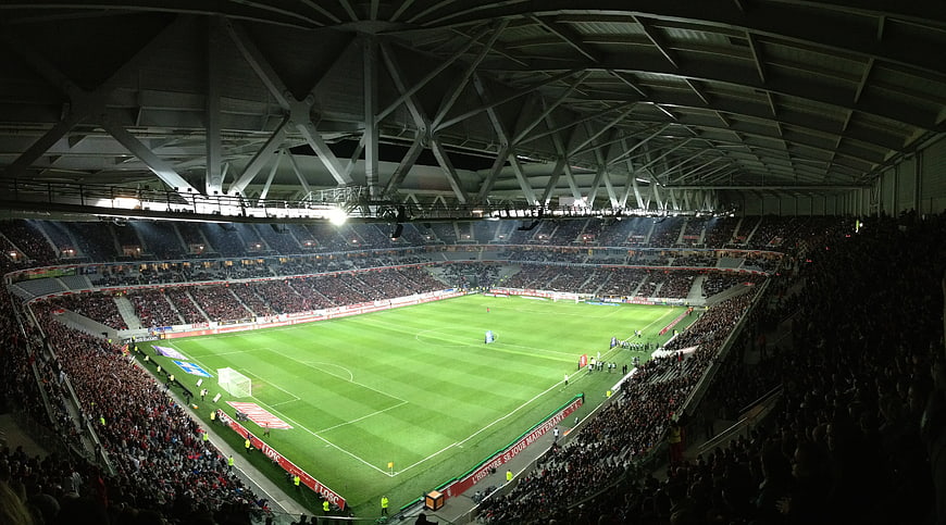 Wide Angle View of Football Stadium at Night