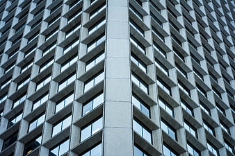 Modern Concrete Office Building Facade with Geometric Windows