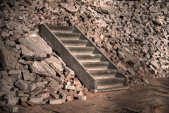 Concrete Staircase Embedded In Demolition Rubble And Broken Bricks