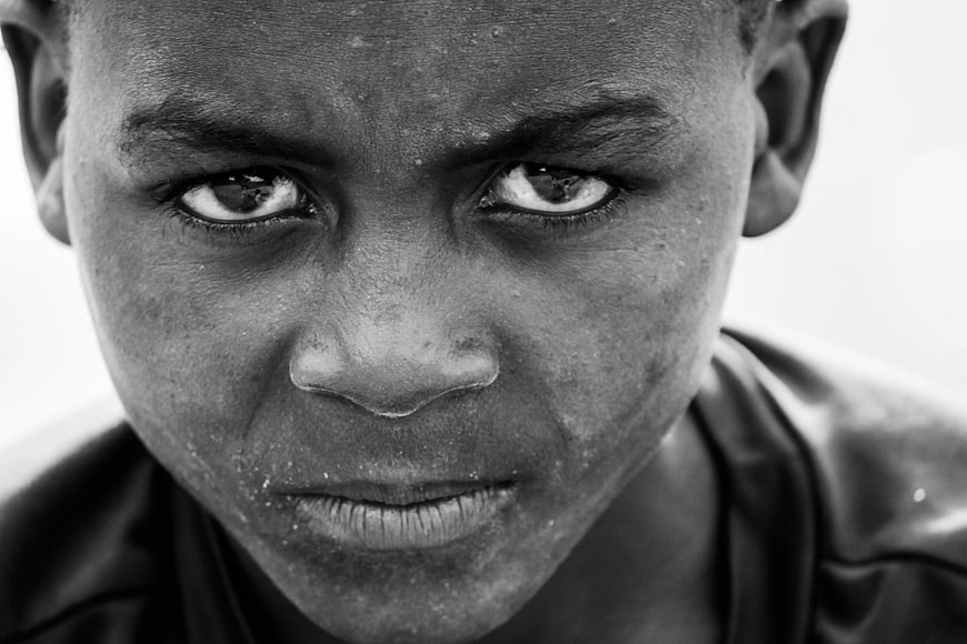 Intense Black and White Portrait of a Young Boy