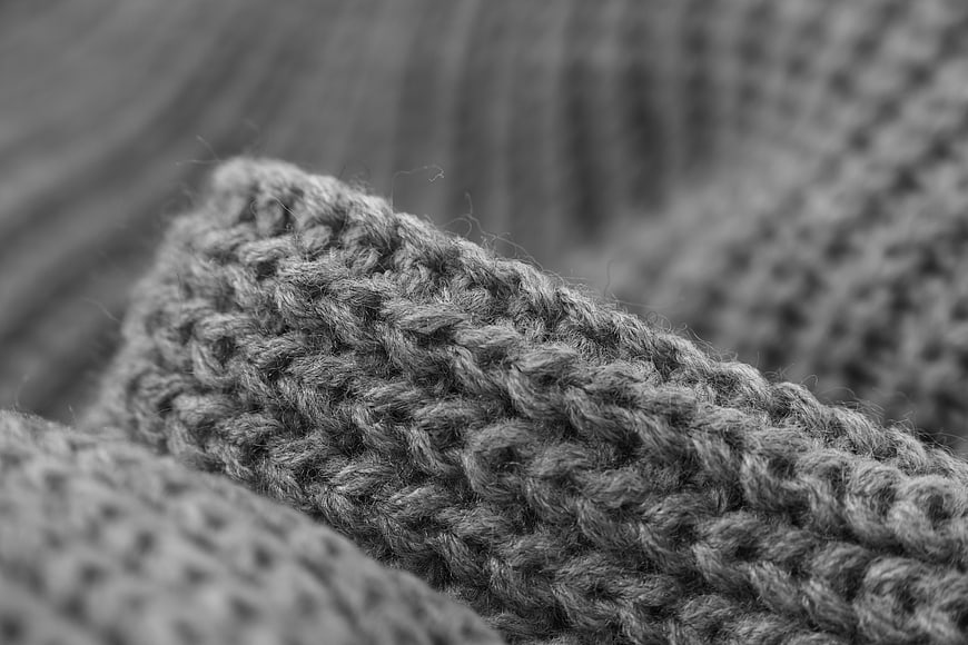Macro Close-Up of Grey Knitted Wool Sweater Texture