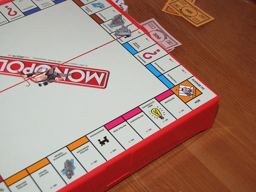 German Monopoly Board Game on Wooden Table