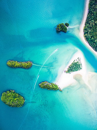 Aerial view of turquoise tropical islands and white sandbar