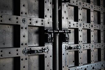 Close-up of ancient medieval iron and wood church door