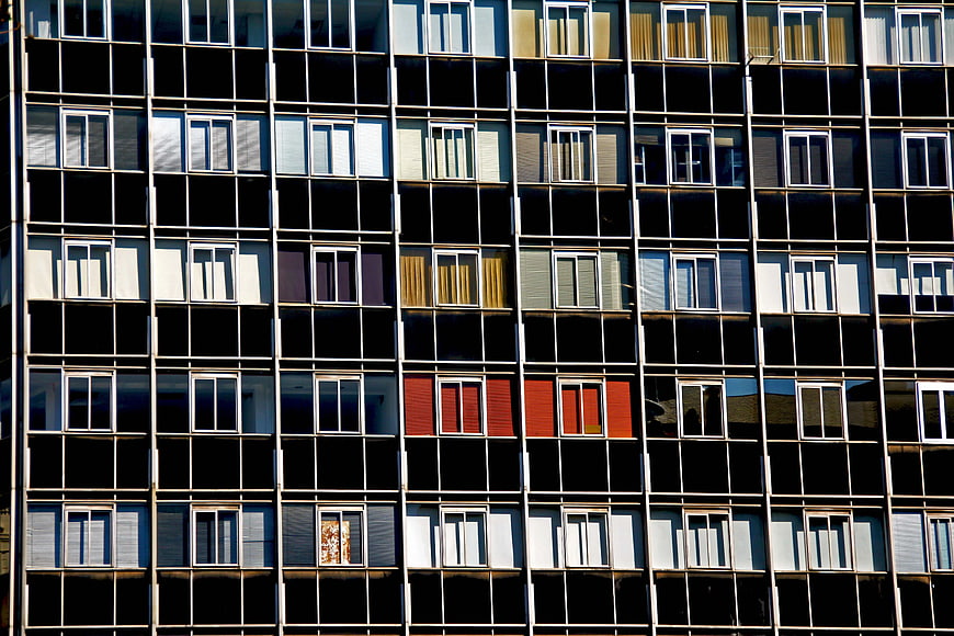 Modern Apartment Building Facade with Grid Windows