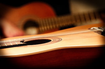 Close-up of Classical Guitar Sound Hole and Strings