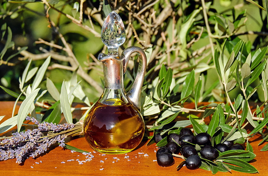 Glass Carafe of Olive Oil with Black Olives and Lavender