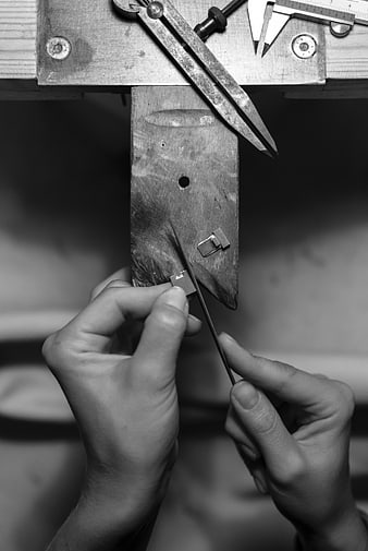 Carpenter Hands Filing Wood Detail Black and White