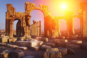 Ancient Roman Ruins at Sunset with Arches and Columns