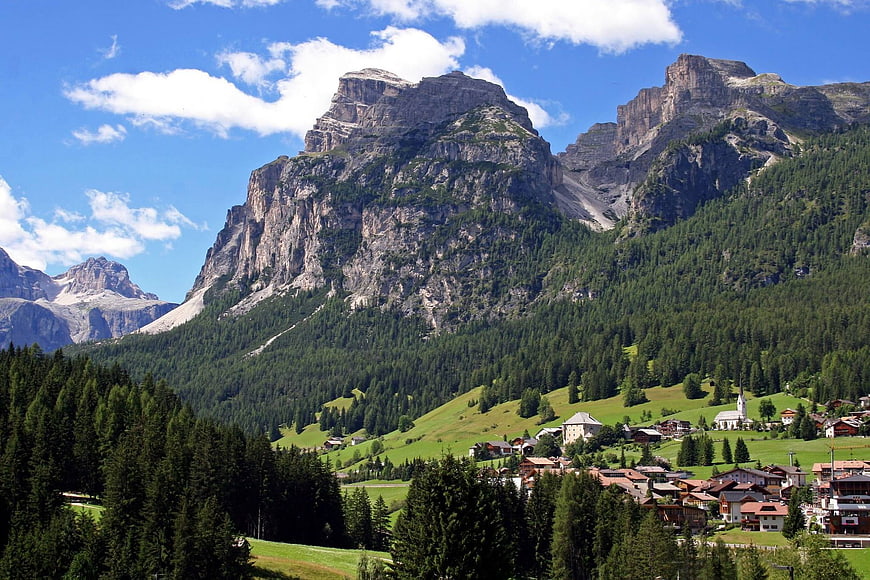 Panoramic view of Italian Dolomites mountains and alpine village