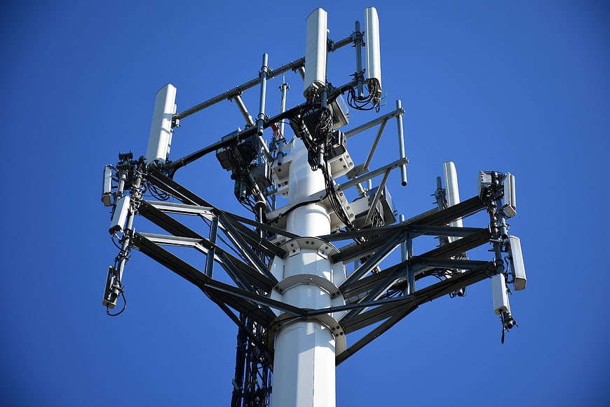 Cellular Tower Antennas Against Clear Blue Sky