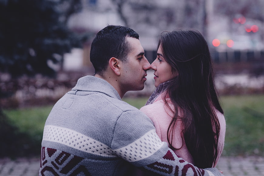 Romantic Couple Touching Noses in Winter Park