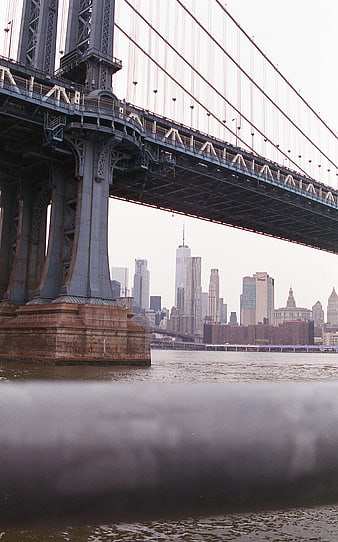 Manhattan Bridge View with NYC Skyline and Blurred Foreground