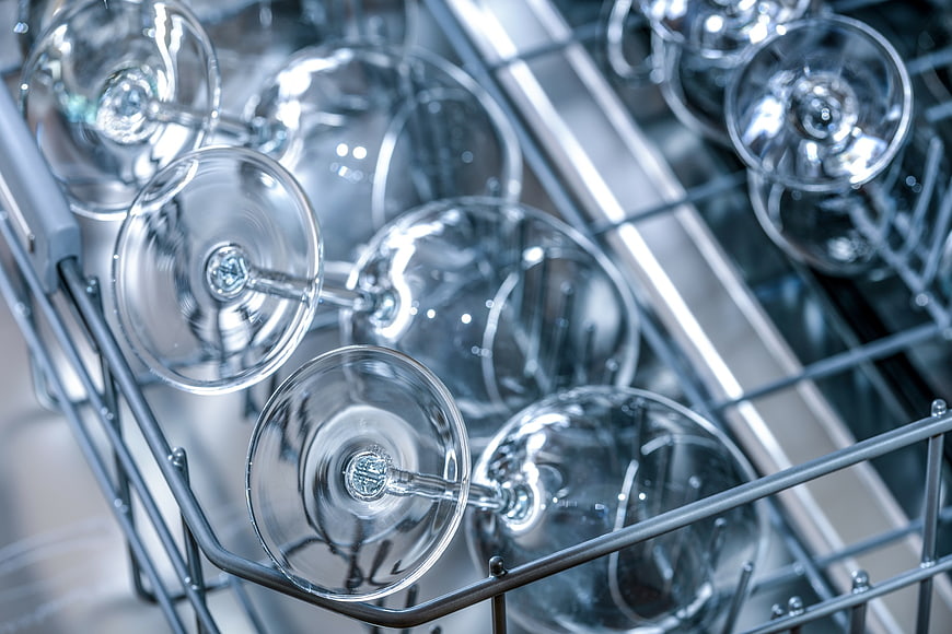 Clean wine glasses in dishwasher rack
