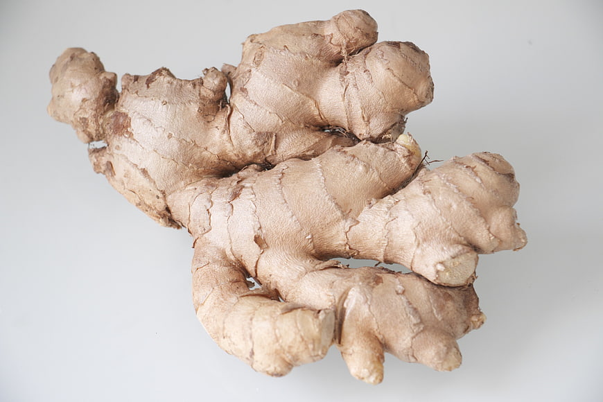 Fresh Ginger Root On White Background