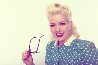 Vintage Pinup Woman with Glasses and Polka Dot Dress