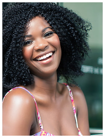 Smiling Black Woman With Curly Hair In Summer Outfit