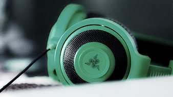 Close-up of Green Razer Gaming Headphones