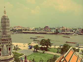 Aerial View of Wat Arun Temple and Chao Phraya River in Bangkok
