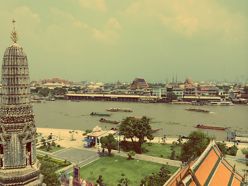 Aerial View of Wat Arun Temple and Chao Phraya River in Bangkok