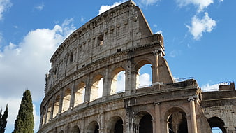 Colosseum in Rome, Italy against blue sky