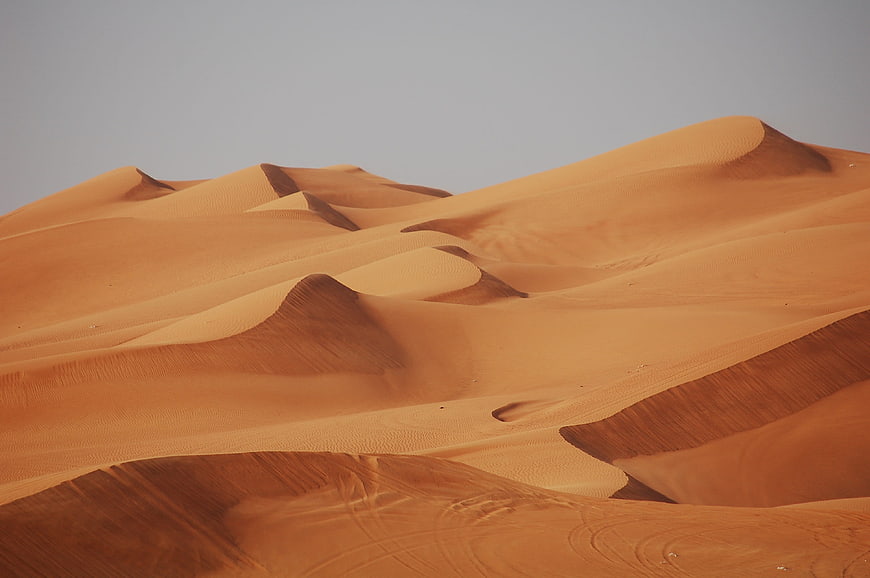 Golden sand dunes in the desert landscape