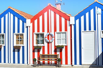 Colorful striped beach houses in Cascais, Portugal