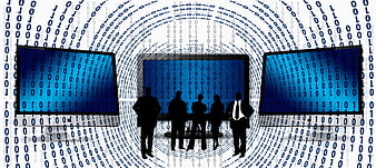 Business team silhouettes in digital data tunnel with monitors