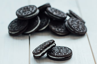 Stack of Oreo Cookies on White Wooden Table