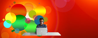 Young man working on laptop with colorful abstract background