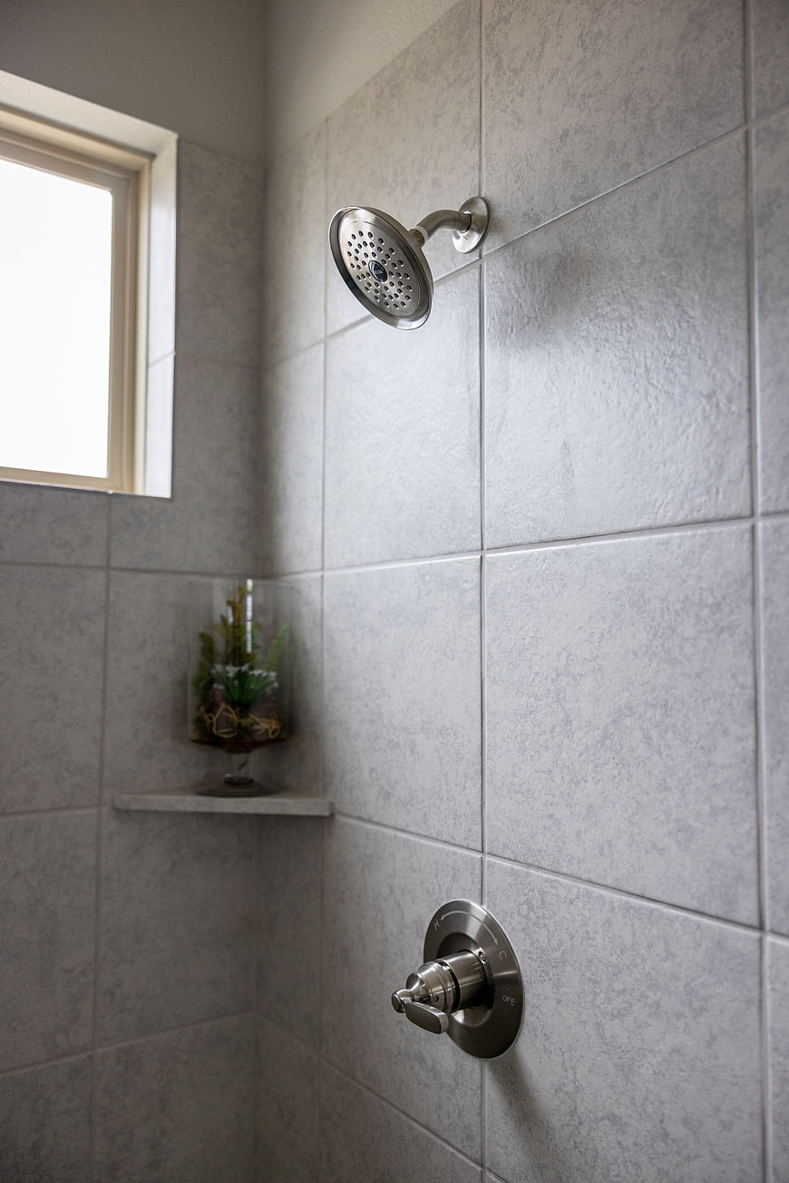 Modern Gray Tiled Shower Interior with Window