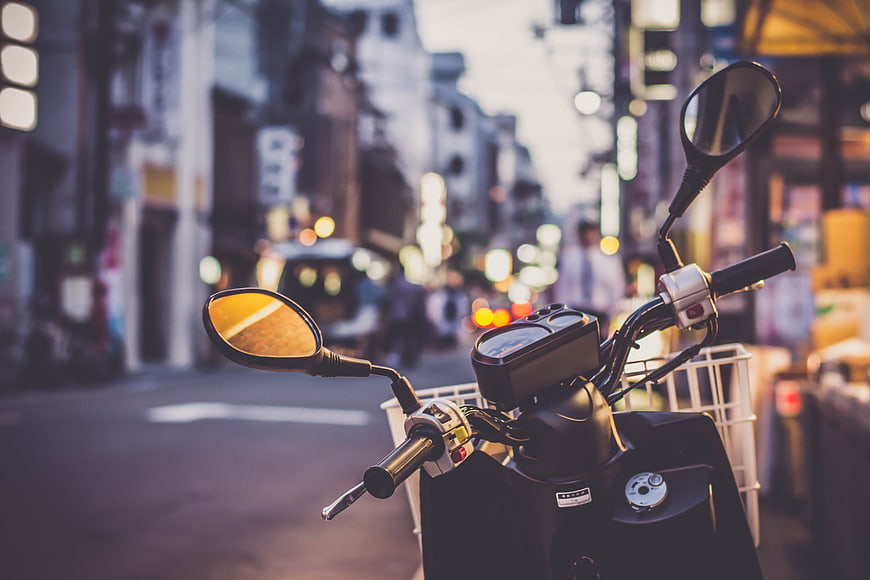 Scooter Handlebars on Busy Asian City Street