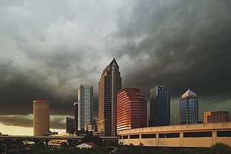 Dramatic Tampa Skyline Under Stormy Clouds