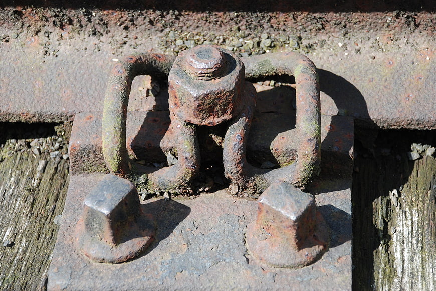 Close-up of Rusted Railway Track Fasteners and Bolts