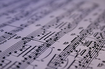 Close-up of classical sheet music with shallow depth of field