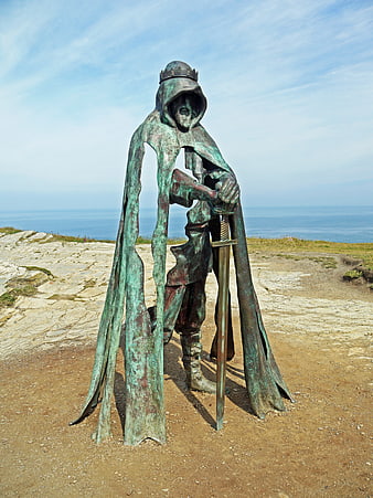 Bronze King Arthur Sculpture with Excalibur on Cornish Coast