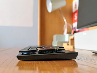 Close-up of mechanical keyboard on wooden desk