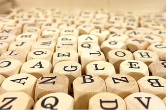 Close-up of wooden alphabet blocks with letters