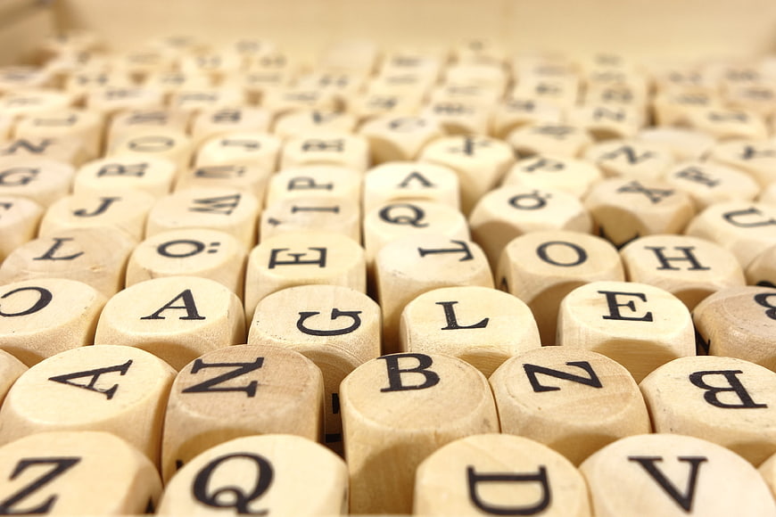 Close-up of wooden alphabet blocks with letters