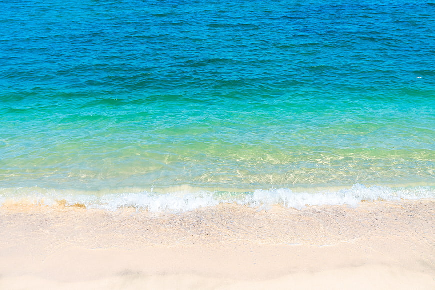 Tropical Beach with Turquoise Water and White Sand