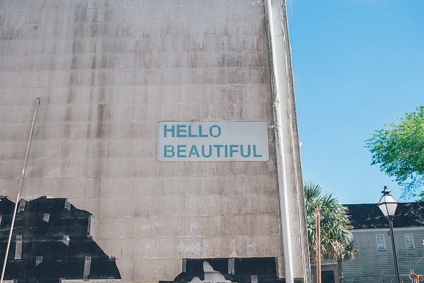 Hello Beautiful Sign on Weathered Concrete Wall